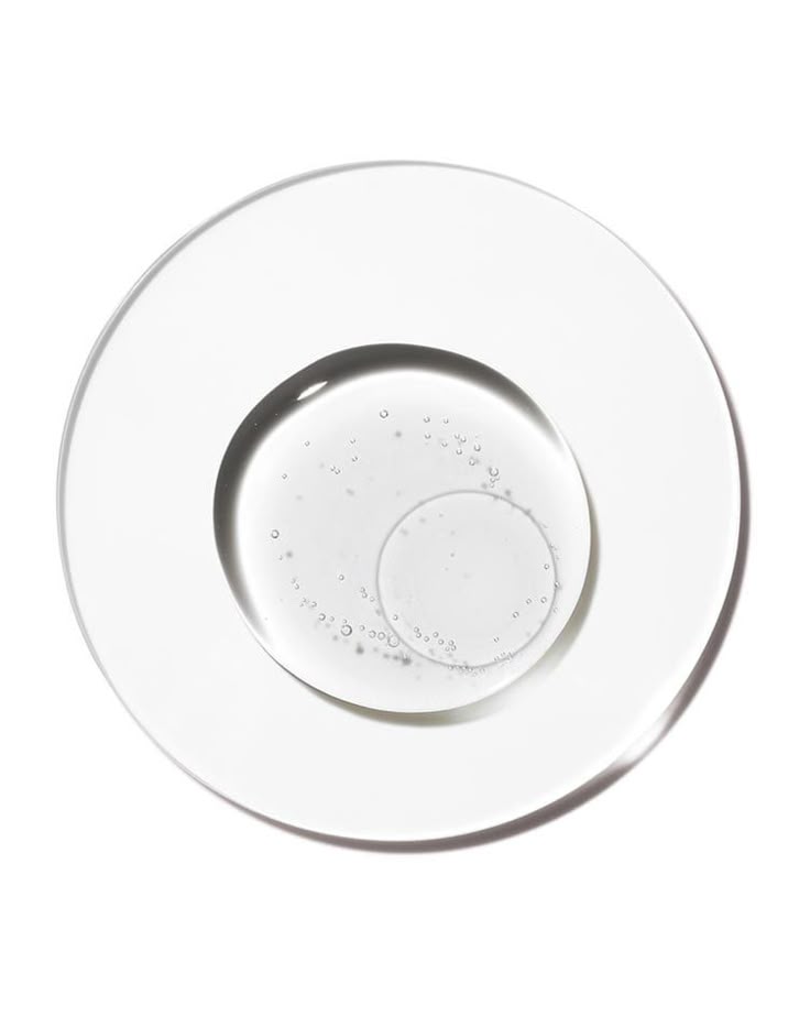Clear gel texture of IMEAN bioengineered serum in a glass dish with suspended microbubbles