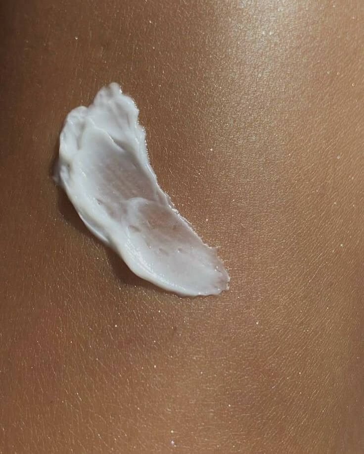 Swatch of peptide cream on glowing skin surface — showcasing barrier-repair formulation by IMEAN Beauty intentional skincare.