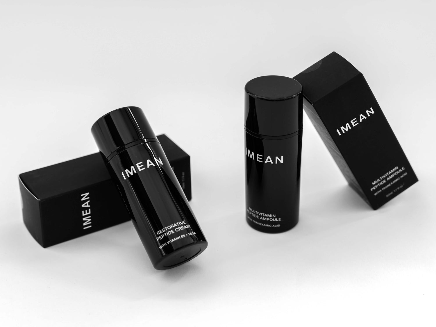 IMEAN Multivitamin Peptide Ampoule and Restorative Peptide Cream bottles with packaging — featured products in the intentional skincare routine